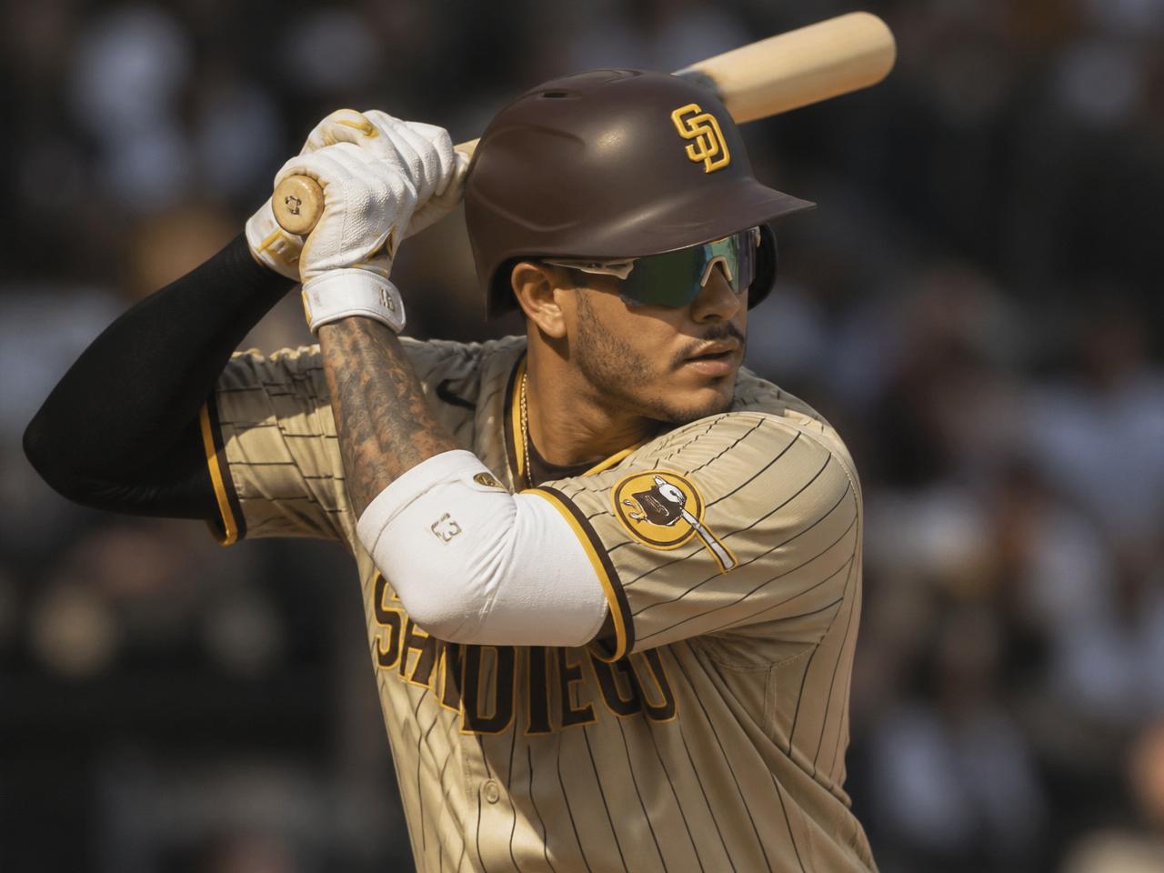 Baseball player at bat wearing wraparound performance sunglasses